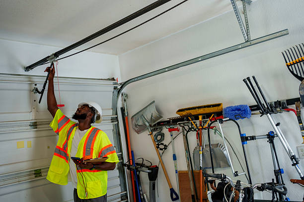 Professional Garage Door Installation technician working in Terryville, NY